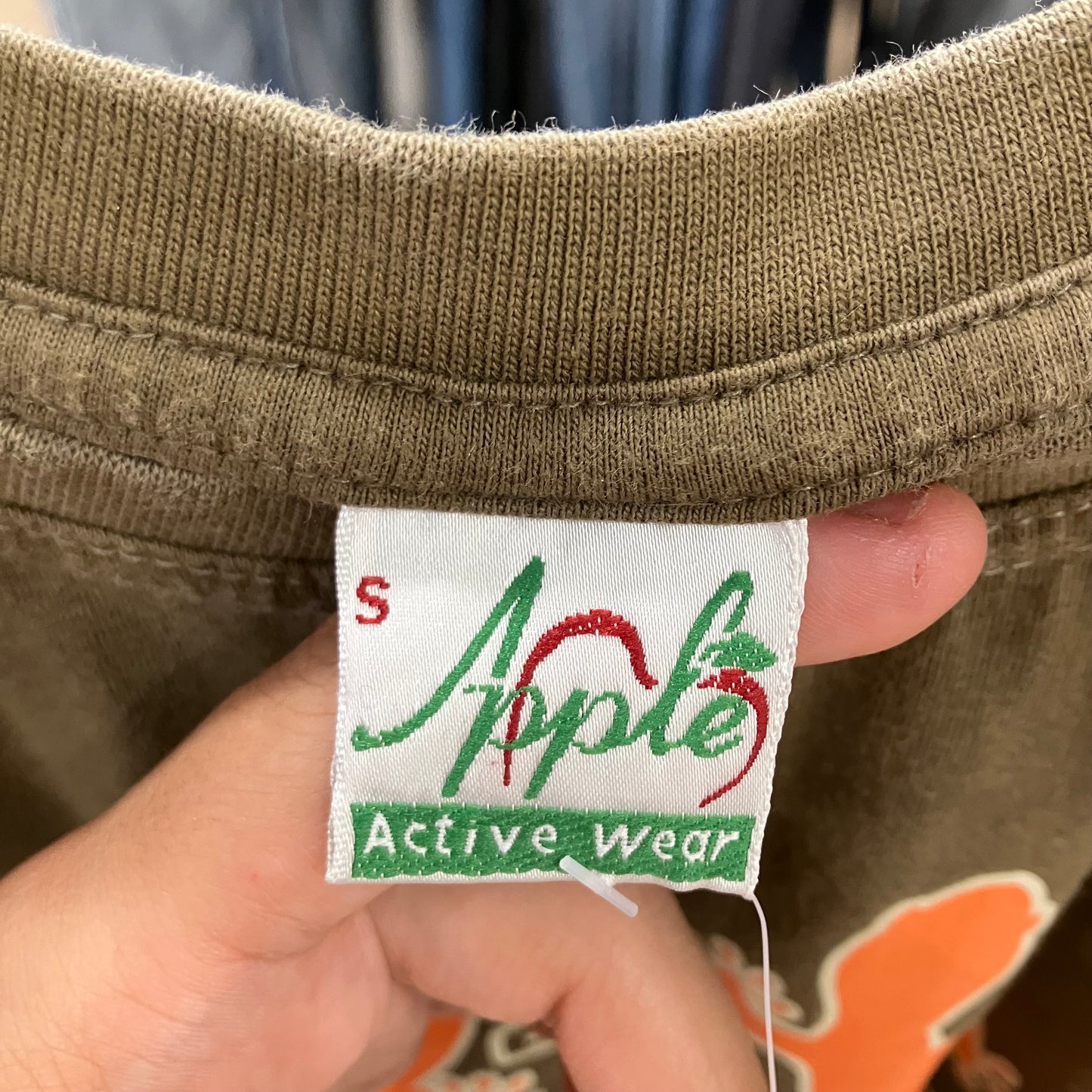 apple guru khaki tee with orange geko design