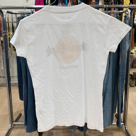 White t-shirt  on a clothing rack