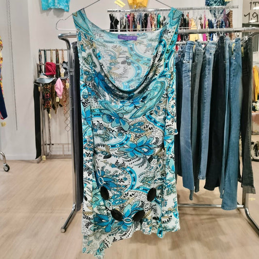 Floral dress hanging on a rack in a clothing store