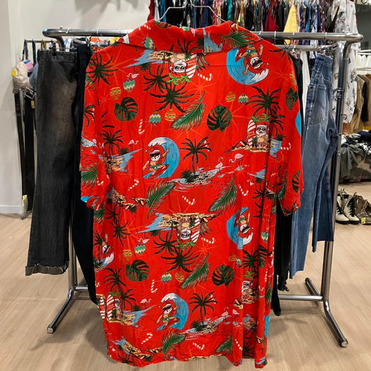 Joy red hawaiian shirt with santa surfing