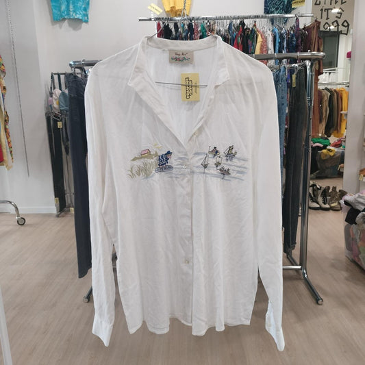 Very nice white embroidered button-down shirt with a sailing embroidery