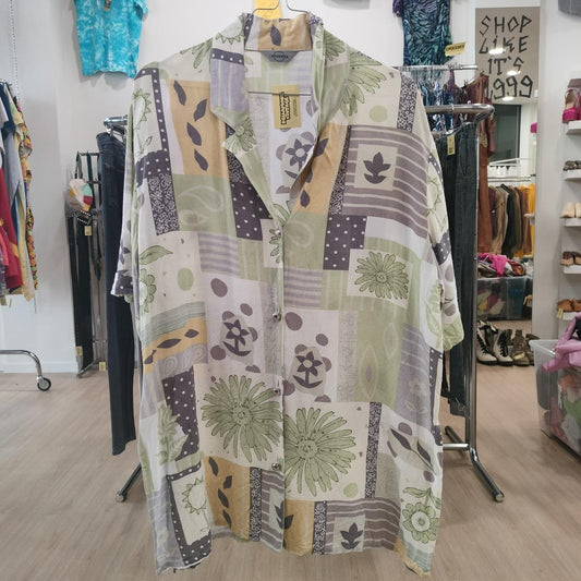 Patterned shirt on a hanger in a clothing store